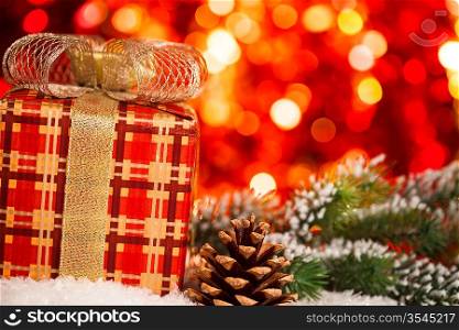 Christmas gift box against lights background