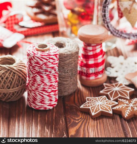 Christmas gift decorations - red and rustic ropes and gingerbread. Christmas gift decorations
