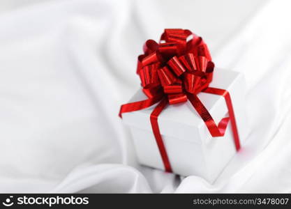 christmas gift on white silk background