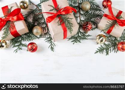 Christmas gifts with red ribbon on white background. Place for text.. Christmas gifts with red ribbon on white background.