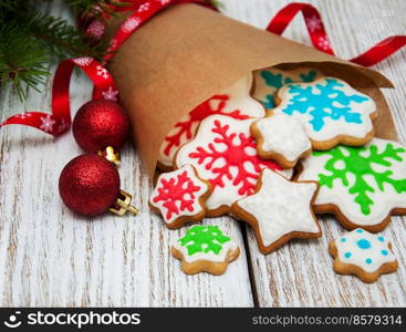 Christmas ginger and honey colorful cookies in a paper packing