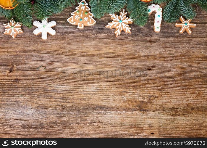 christmas gingerbread cookies. christmas gingerbread cookies border on wooden background