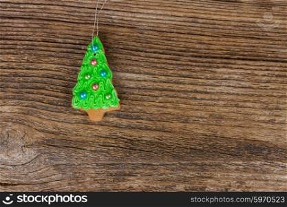christmas gingerbread cookies. christmas gingerbread evergreen tree cookies on wooden background