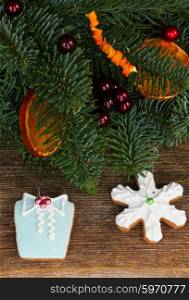 christmas gingerbread cookies. christmas gingerbread frosted cookies with fir tree close up