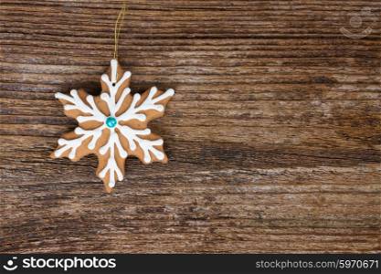 christmas gingerbread cookies. christmas gingerbread snowflake cookies on wooden background