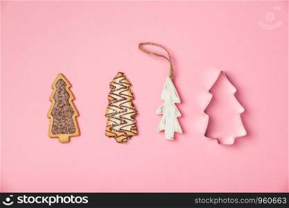 Christmas gingerbread cookies in the shape of a Christmas tree, flat lay. Christmas gingerbread cookies in the shape of a Christmas tree