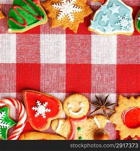 Christmas gingerbread cookies over tablecloth