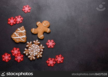 Christmas gingerbread. Delicious gingerbread cookies with honey, ginger and cinnamon. Winter composition. Delicious gingerbread cookies with honey, ginger and cinnamon