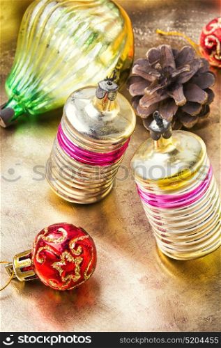 Christmas glass vintage baubles. Vintage glass Christmas baubles on a bright copper retro background