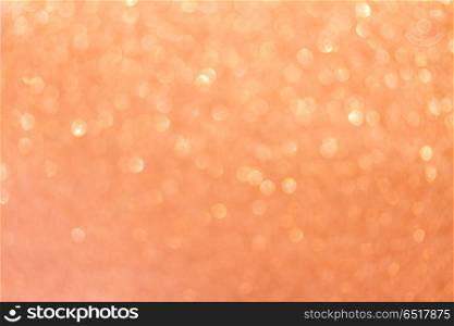 Christmas glittering background. Christmas festive abstract glittering defocused pink background with bokeh lights