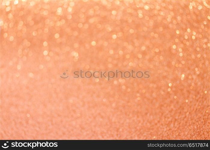 Christmas glittering background. Christmas festives glittering defocused pink background with bokeh lights