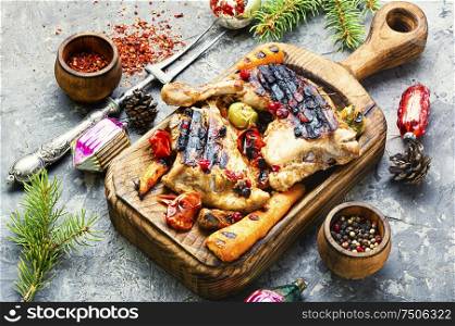 Christmas grilled chicken legs.Roasted chicken leg with spicy. Roasted chicken legs with vegetables