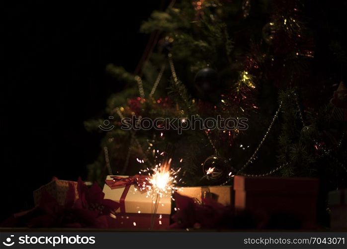 Christmas holding bengal burning sparkler light