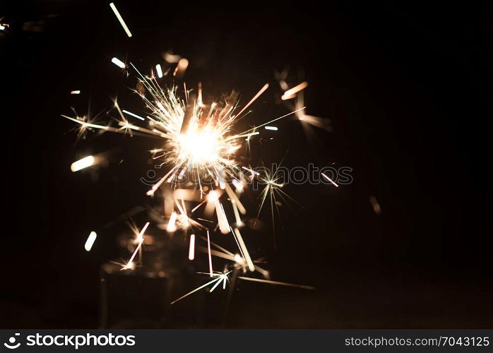 Christmas holding bengal burning sparkler light