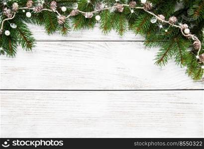 Christmas holiday background - tree  and decoration on a wooden table