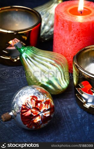 christmas holiday decorations. holiday vintage Christmas glass baubles and candle