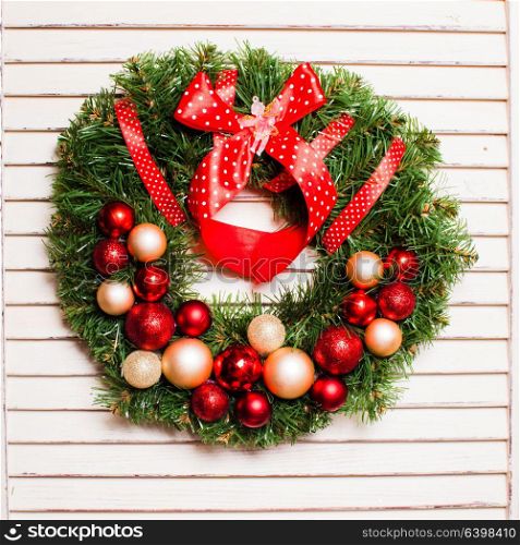 Christmas holiday wreath with red and gold balls. Christmas holiday wreath