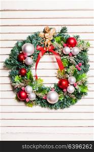 Christmas holiday wreath with red and white balls. Christmas holiday wreath