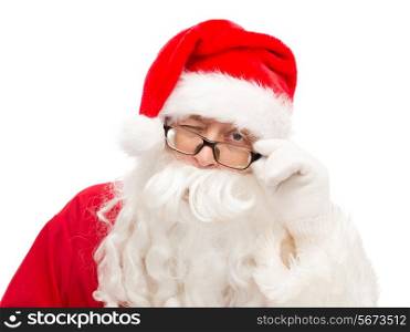 christmas, holidays and people concept - close up of santa claus in glasses winking