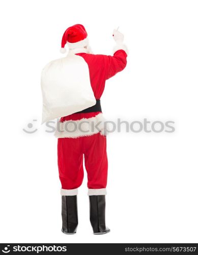 christmas, holidays and people concept - man in costume of santa claus with bag writing something from back