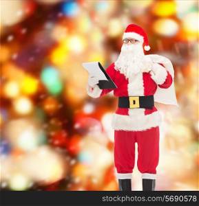 christmas, holidays and people concept - man in costume of santa claus with notepad and bag over red lights background