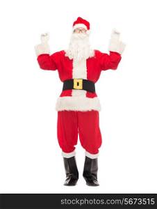 christmas, holidays and people concept - man in costume of santa claus having fun
