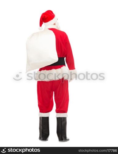 christmas, holidays and people concept - man in costume of santa claus with bag from back