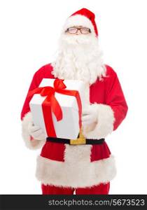 christmas, holidays and people concept - man in costume of santa claus with gift box