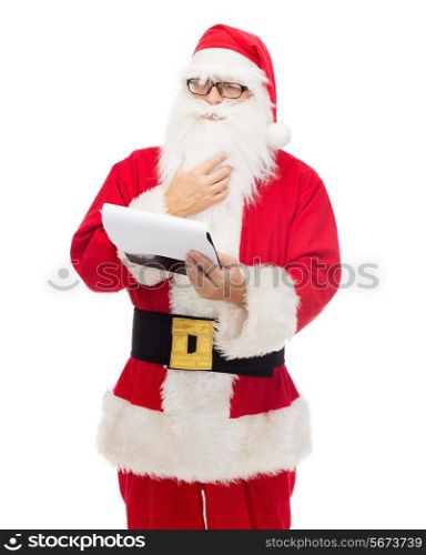 christmas, holidays and people concept - man in costume of santa claus with notepad