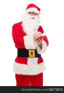 christmas, holidays and people concept - man in costume of santa claus with notepad and pen