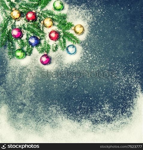 Christmas holidays background. Christmas decorations and ornaments with snow. Vintage style toned picture