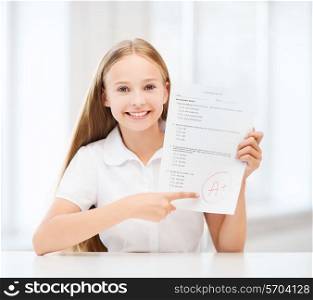 christmas, holidays, celebration, greeting and people concept - smiling woman in santa helper hat with gift box writing letter or sending post card over blue lights background