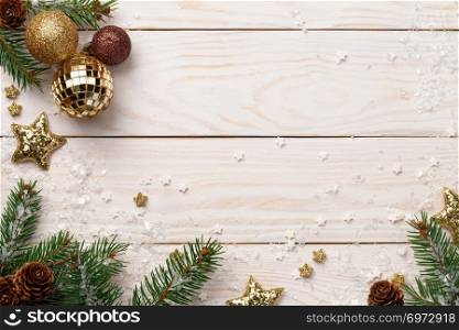Christmas holidays composition on wooden background. Copy space. Top view 