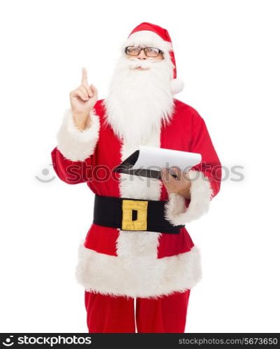 christmas, holidays, gesture and people concept - man in costume of santa claus with notepad pointing finger up