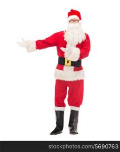 christmas, holidays, gesture and people concept - man in costume of santa claus