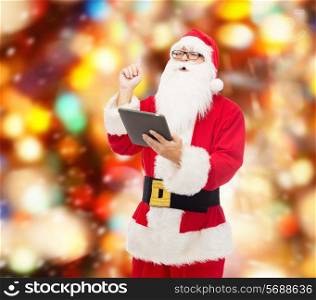 christmas, holidays, technology and people concept - man in costume of santa claus with tablet pc computer pointing finger up over red lights background