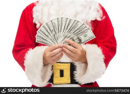 christmas, holidays, winning, currency and people concept - close up of santa claus with dollar money
