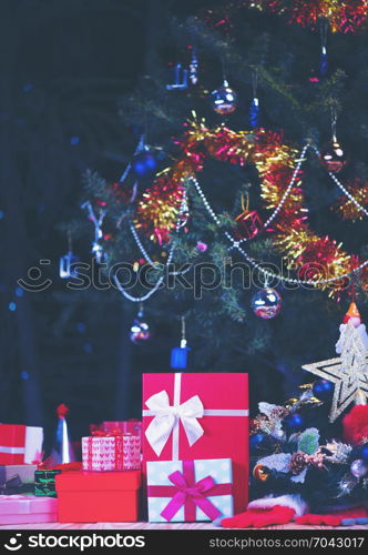 Christmas home room with tree and festive bokeh lighting, blurred holiday background