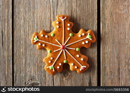 Christmas homemade gingerbread cookie on wooden table