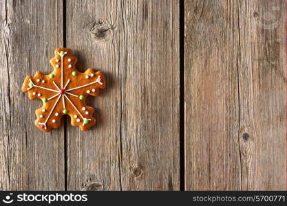 Christmas homemade gingerbread cookie on wooden table