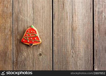 Christmas homemade gingerbread cookie over wooden table