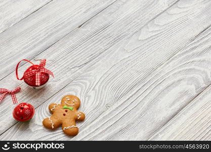 Christmas homemade gingerbread cookies and decoration on wooden background