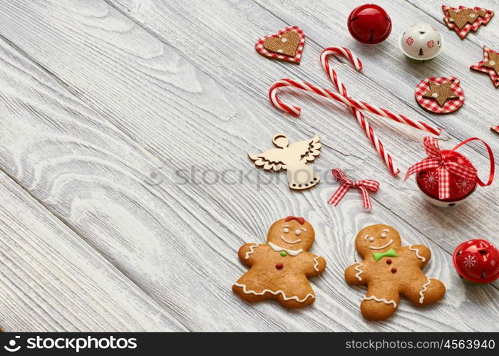 Christmas homemade gingerbread cookies and decoration on wooden background