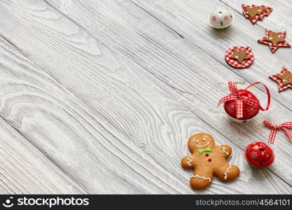 Christmas homemade gingerbread cookies and decoration on wooden background