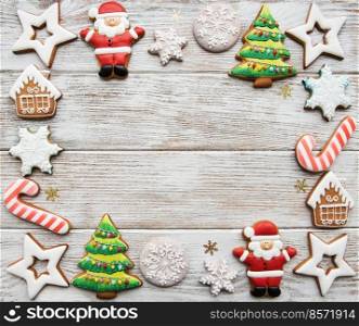 Christmas homemade gingerbread cookies  on a old wooden background
