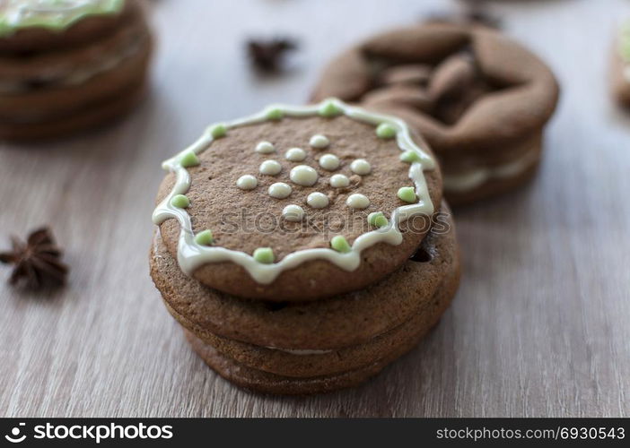 Christmas homemade gingerbread cookies on a wooden table