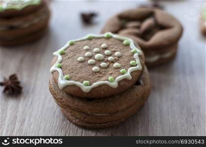 Christmas homemade gingerbread cookies on a wooden table