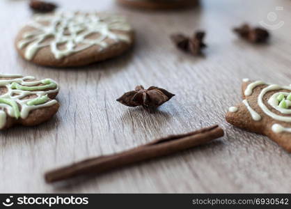 Christmas homemade gingerbread cookies on a wooden table. Anise star spice