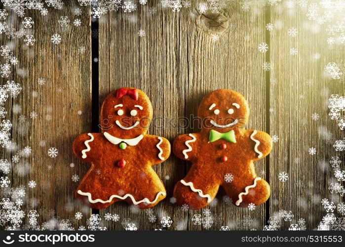 Christmas homemade gingerbread cookies on wooden background