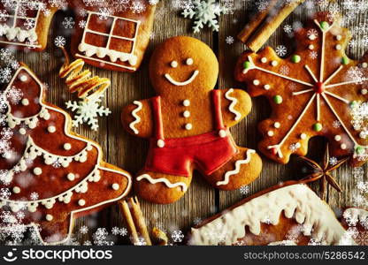 Christmas homemade gingerbread cookies on wooden table